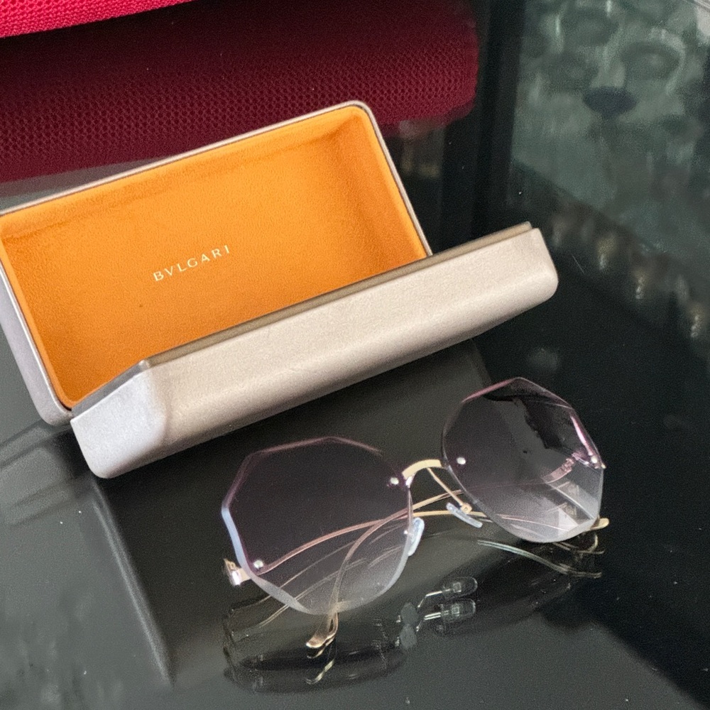 BGLVARI rimless sunglasses. No scratches. Excellent condition.